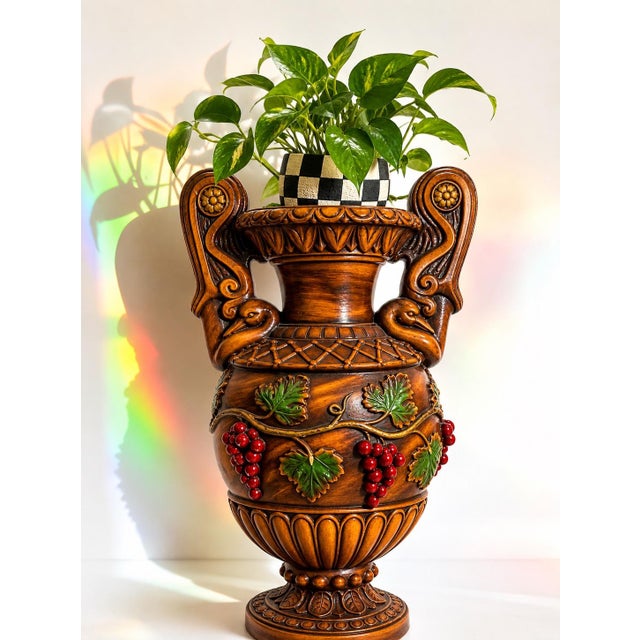Exceptional large vintage Neoclassical-style pedestal urn featuring dramatic swan-form handles, scrolling volutes,...