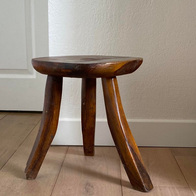 Antique tripod stool, solid wood, deep patina, beautifully irregular. One of the legs is damaged (see photos), but the...