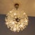 Beautiful and delicate fourteen-light brass fixture by Emil Stejnar for Nikoll with copious amounts of Austrian crystals,...