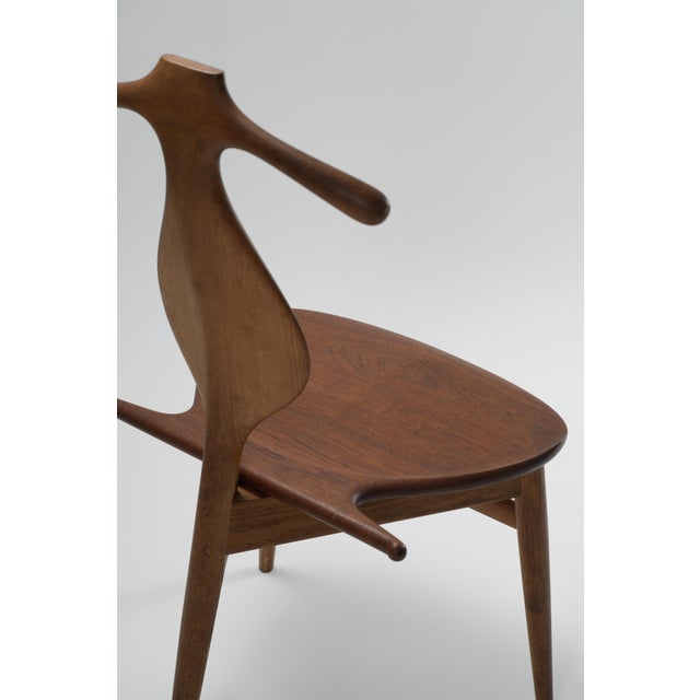 1953 Model JH-540 Valet chair by Hans J. Wegner for Johannes Hansen. This gorgeous piece of mid century design is as...