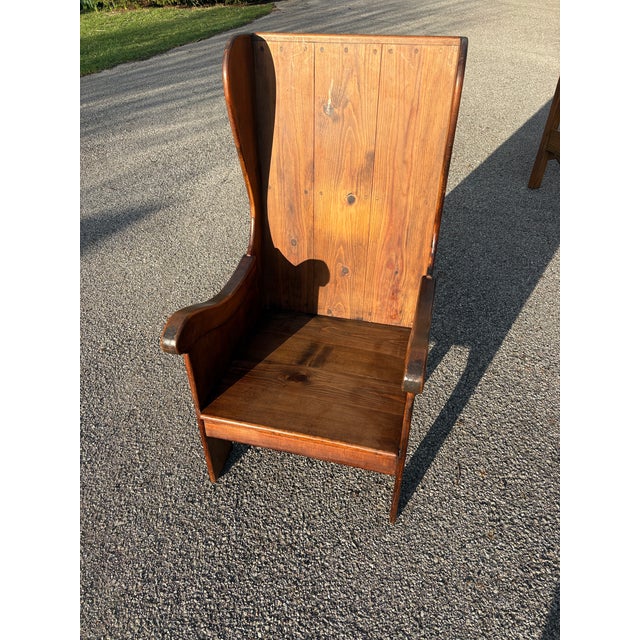 Lambing style chair that is in the style of Habersham but is unmarked. Features a dark brown finish.