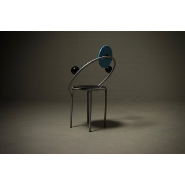 An iconic piece of Postmodern design history, this authentic “First” chair was designed by Michele De Lucchi in 1983....