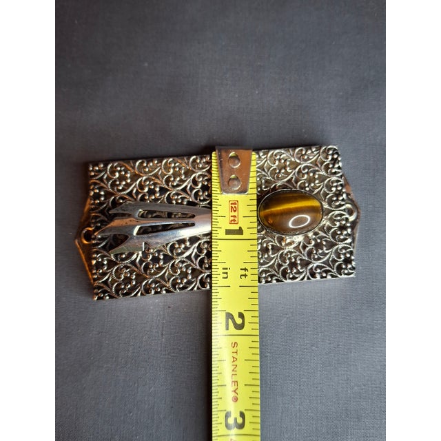 This exquisite vintage Israeli mezuzah case is expertly crafted from .925 sterling silver, showcasing the masterful...