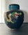 A vibrant vintage Chinese cloisonné ginger jar featuring a colorful dragon design. Crafted with intricate enamel work and...