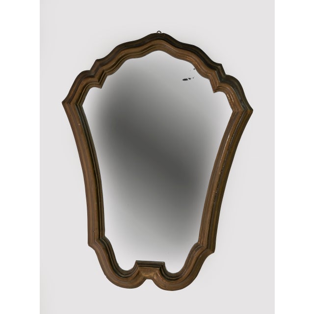 Vintage Mirror is an original design object realized in the early 20th Century in Italy. Good conditions except for some...