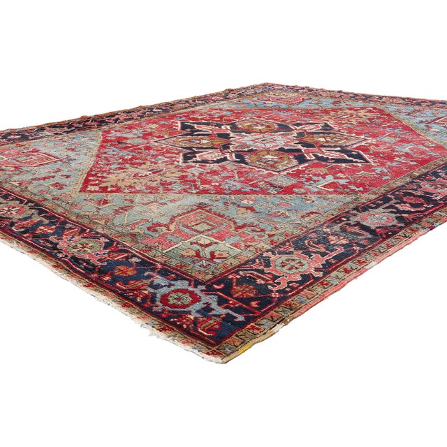 79129 Distressed Antique Persian Heriz Rug, 08'07 x 11'00. This hand-knotted wool distressed antique Persian Heriz rug...