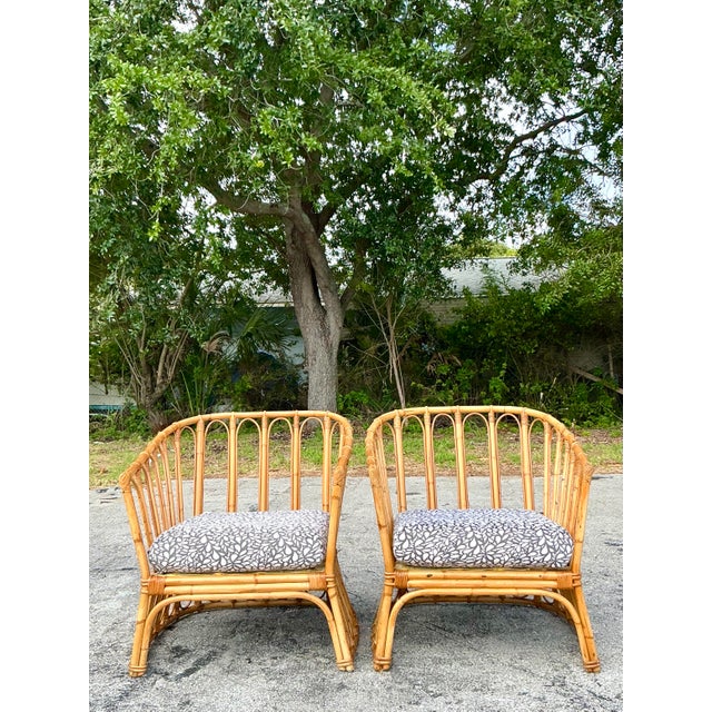 Inspired by the timeless designs of Franco Albini, this pair of vintage stick rattan lounge chairs brings an effortlessly...