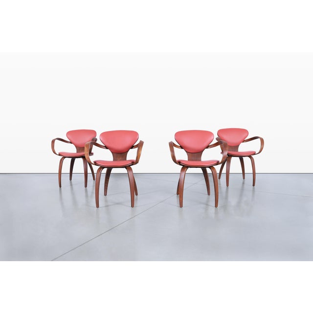 Immerse yourself in the elegance of the 1980s with these exquisite vintage "Pretzel" armchairs, masterfully designed by...