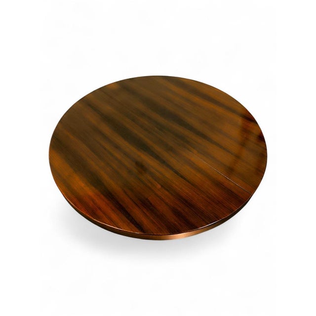 Exceptional extendable rosewood table with a pyramidal base, designed by Vittorio Introini and produced by Saporiti in the...