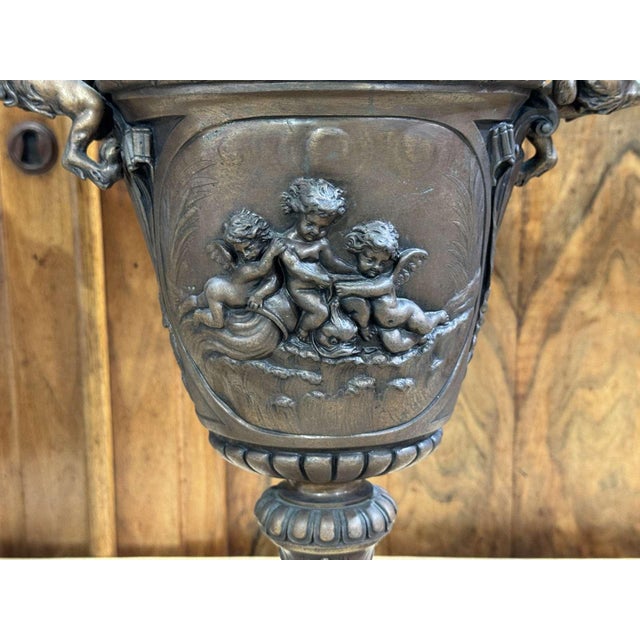 Pair of Napoleon III covered vases in spelter and marble base - H=59cm, W=30cm, D=18cm.