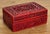Vintage Chinoiserie style enamel box with intricately carved red exterior and black interior. The pop of red every room...