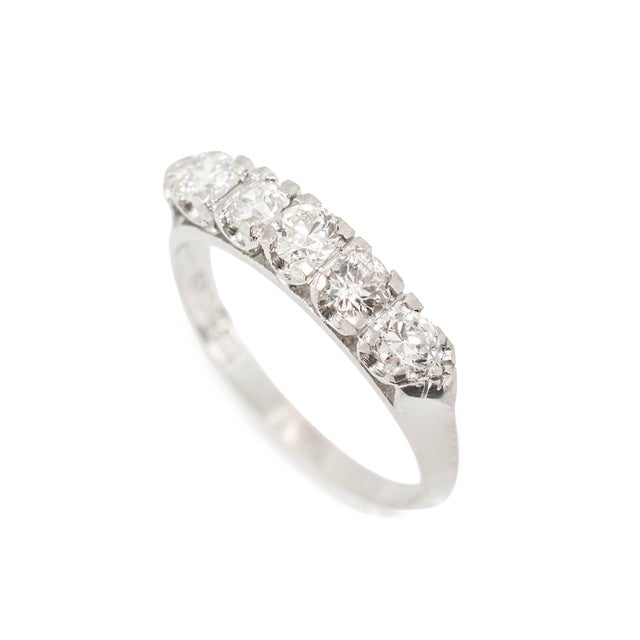 Gender: Ladies Metal Type: 900 Platinum Ring Size: 5.25 Width: 1.70 mm Weight: 2.98 grams Ladies handmade 900 platinum...