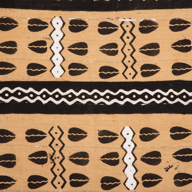 Commonly known as Bogolan or Bògòlanfini, this cotton textile was hand spun, handwoven, then dyed through a technique that...