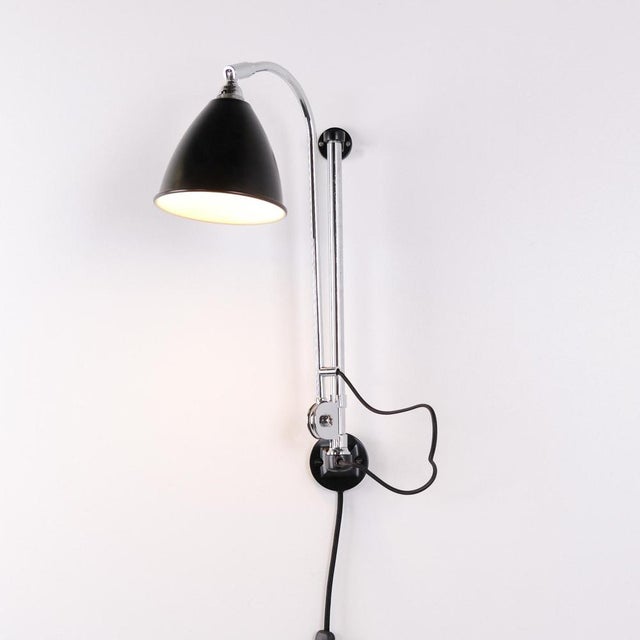 Bestlite wall lamp model bl6 designed by robert dudley best in the 1930s and manufactured by gubi. Crafted with a chrome...