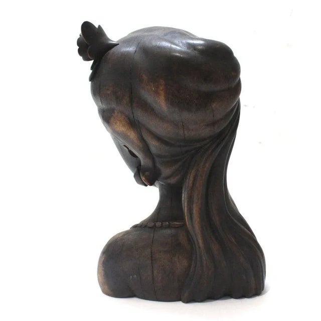 This stylish rosewood figure of a young woman was created in Bali and it will make a subtle statement with its form and...