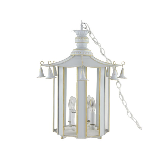 Chinese style Toler chandelier with gold and grey metal frame and ornate roof 16ʺW × 16ʺD × 19ʺL There is a 12" chain with...
