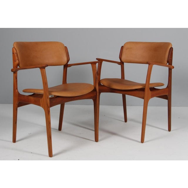 Erik Buch armchair frame of teak. New upholstered with cognac vintage full grain aniline leather. Model 50 made by Odense...