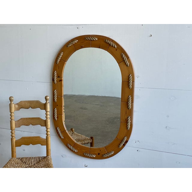 candinavian wall mirror from the 1970s — combining two of the most expressive natural materials of the decade in a way...