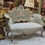 Bring an elegant European character to your interior with this ornate French Rococo-style settee, featuring a beautifully...