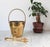 Petite vintage brass ice bucket with brass bird claw tongs. Marked "Made in India" on the bottom of the bucket. Some age...