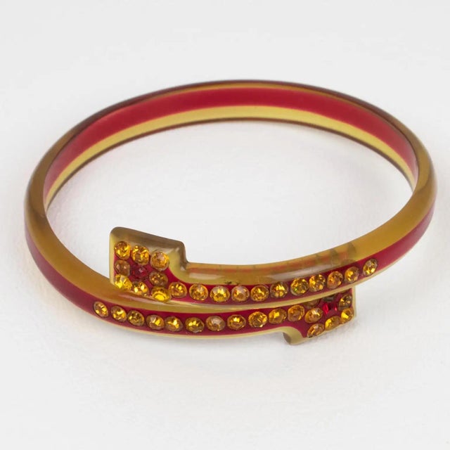 This stunning French celluloid and sparkle bypass bracelet bangle dates from the 1920s. The rare piece boasts transparent...