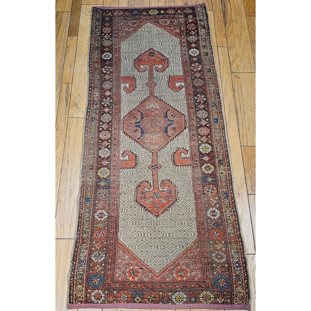 "This exquisite vintage Persian Malayer rug from the late 19th century is one of the most beautiful and rare examples of...
