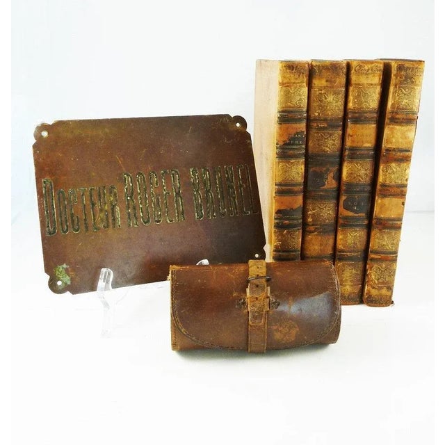 A vintage French bronze sign for a doctors office. Docteur Roger Brunel is engraved on the bronze plaque. Ready to hang or...