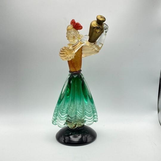 Gorgeous vintage sculpture made of hand-blown Murano art glass in green, red/orange, and clear glass with gold flecks,...