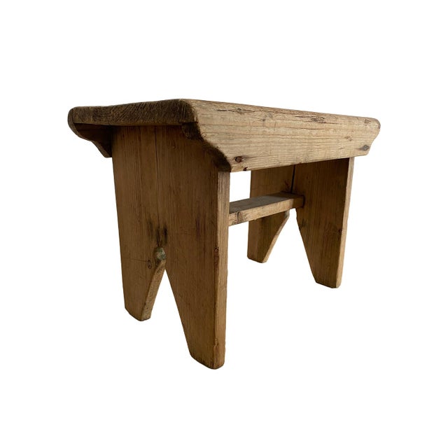 French rustic pine chalet stool with cut-out motif to seat.