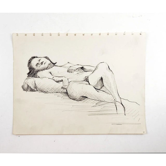 Pen and ink on paper reclining nude figure drawing. Unsigned. Unframed, age toning, edge perforations from sketch book.