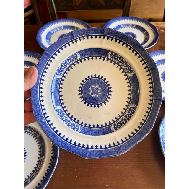 11 Antique Blue Transfer Decorated 8 1/4" Plates, "Dagger Border" by J. Wedgwood Made by John Wedgwood, of...