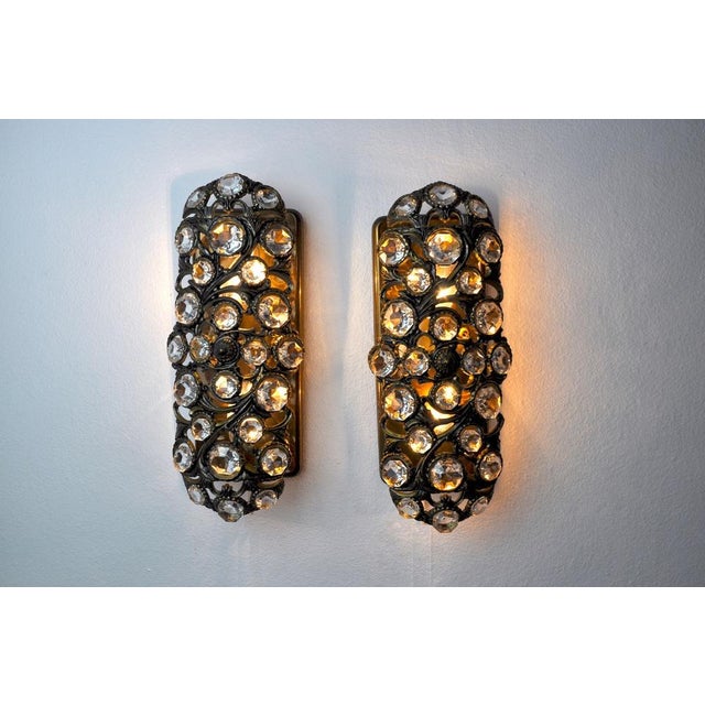 Rare pair of palwa sconces designated by ernest palm and produced in the 1960s in barcelona. Brass structure composed of...