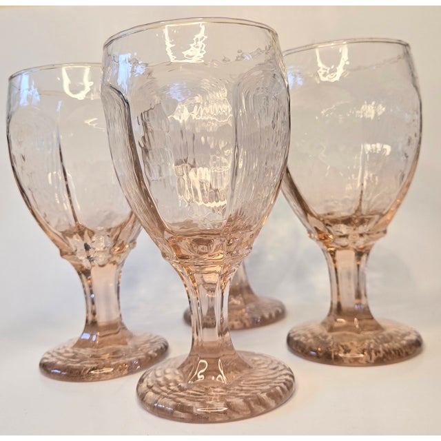 The icy, textured pink goblets have a kind of beachy, rustic feel. I actually have these same pieces in another color, a...