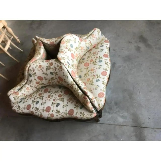 Composition of 4 original sofas 800 in national walnut wood carved by hand and covered in floral fabric colored on beige...