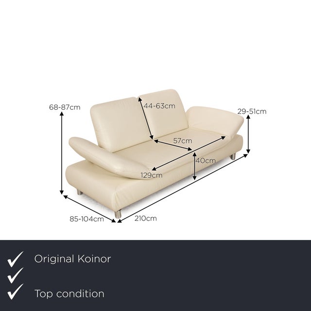The Rivoli sofa from Koinor is covered in cream-colored genuine leather and stands on round metal feet. The adjustable...