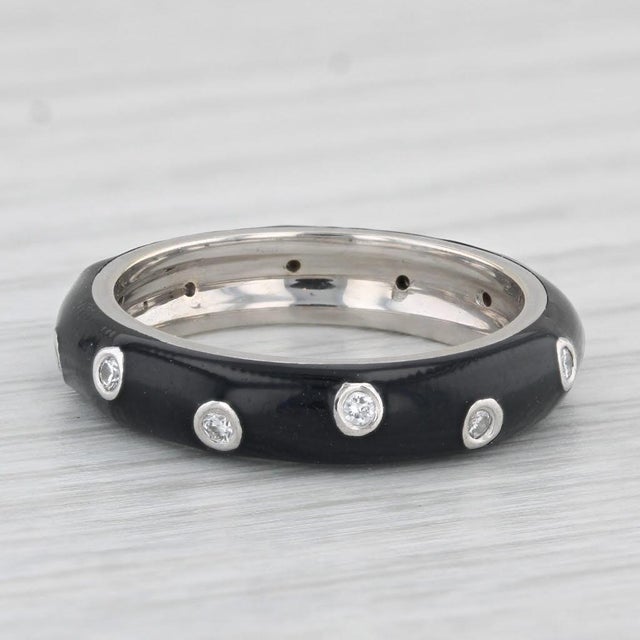 Gemstone Information: - Natural Diamonds - Total Carats - 0.18ctw Cut - Round Brilliant Color - G - H Clarity - VS2 - SI1...