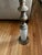 Vintage Hollywood Regency style end table. This table measures 35” tall. The top is constructed of marble, with a marble...