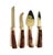 A set of 4 vintage stainless steel cheese serving tools by Sheffield, England. Each features a tortoiseshell plastic...