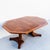 Expertly refinished walnut burl octagonal dining table on split pedestal base, made by Baker in the United States c....