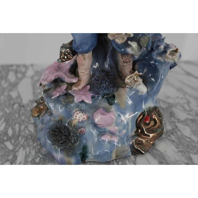 Hand-painted statue of a zither player. The statue is signed on the bottom. Condition: excellent. Provenance: Russia....
