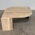 Width: 140 centimeters Height: 45 centimeters Depth: 100 centimeters Striking Italian travertine coffee table, dating from...