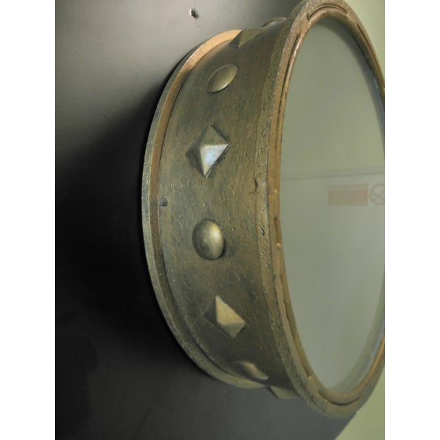 This Spanish wall light is made of gold-painted iron and dates to the 1950s. The lamp retains its original paint and has...