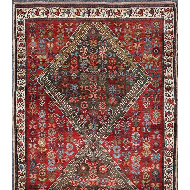 Measures: 3'9 x 8'9. Antique Caucasian Karabagh Runner with Bold Diamond Medallion on Rich Red Field. Keivan Woven Arts /...