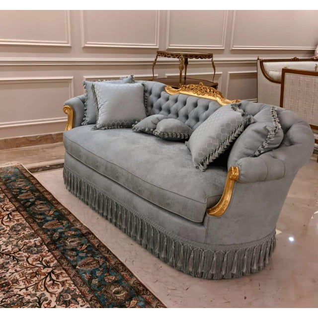 Transform your home with the timeless elegance of this magnificent French Louis XVI-inspired grand sofa, expertly...