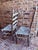 Pair of Early 20th Century Rush Seat Ladderback Side Chairs With Distressed White Chippy Paint Finish For Sale - Image 4 of 12