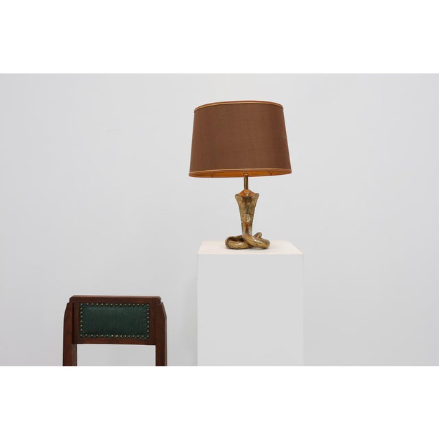 Hollywood Regency Hollywood Regency Brass Cobra Table Lamp with Brown Shade, France, 1970s For Sale - Image 3 of 14