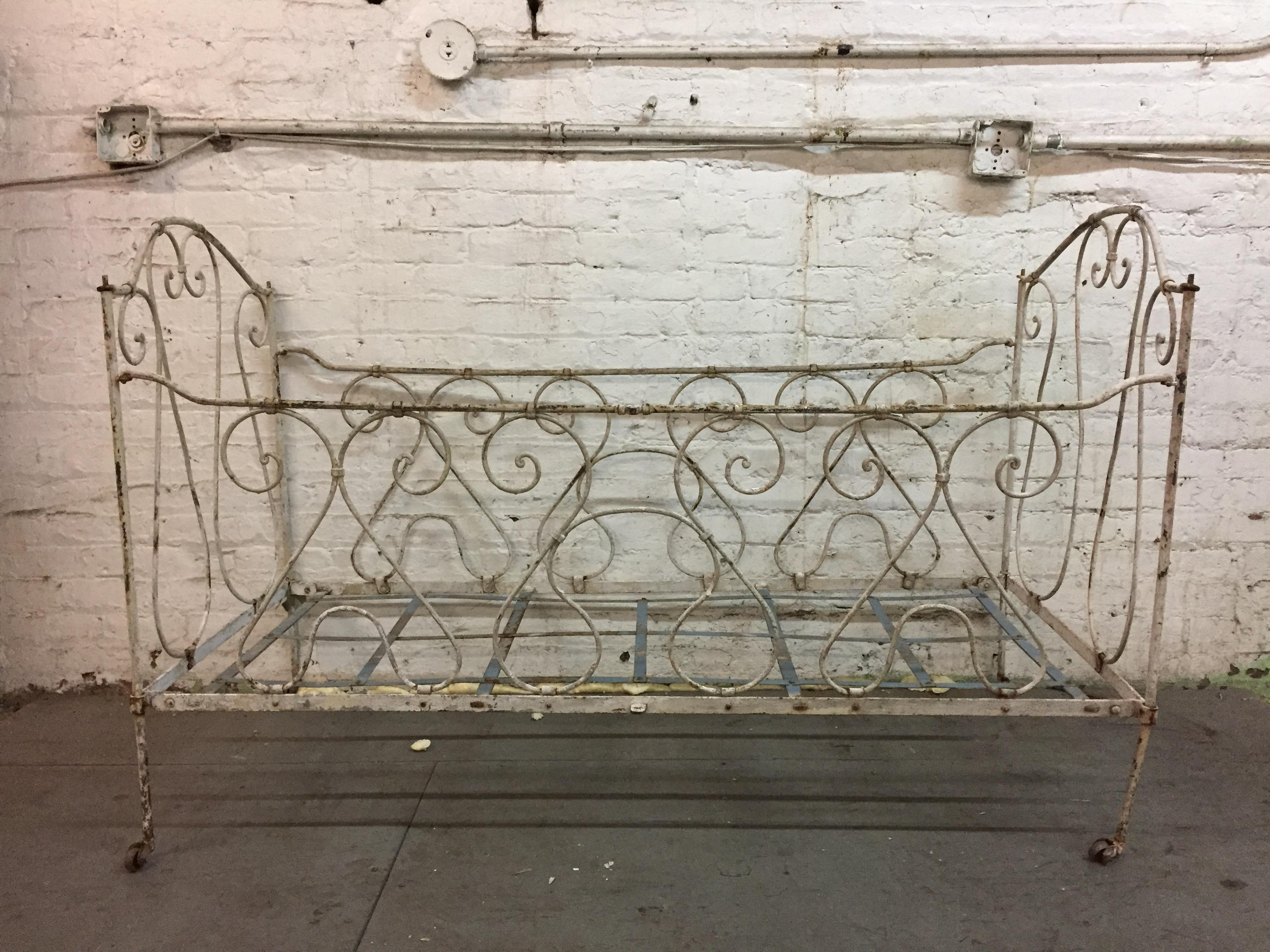 antique iron crib