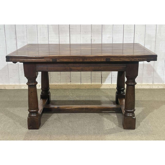 English monastery table with extensions, late 19th century, in elm and oak - Lmin=1.37m Lmax=2.29m W=92cm H=75cm\.