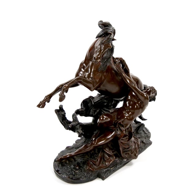 This exquisite 19th-century bronze sculpture by Philippe Poitevin (1831–1907) masterfully depicts Hippolytus, the tragic...