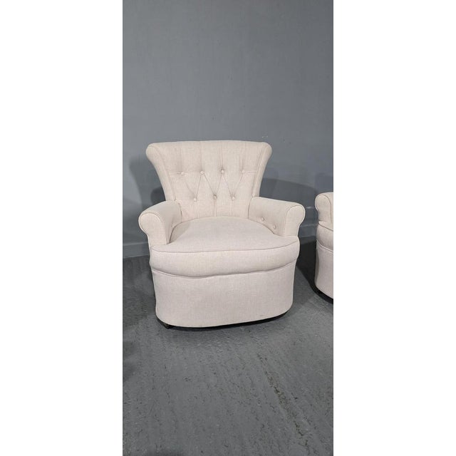 Very nice pair of cream linen covered deep buttoned boudoir chairs, in excellent overall condition.